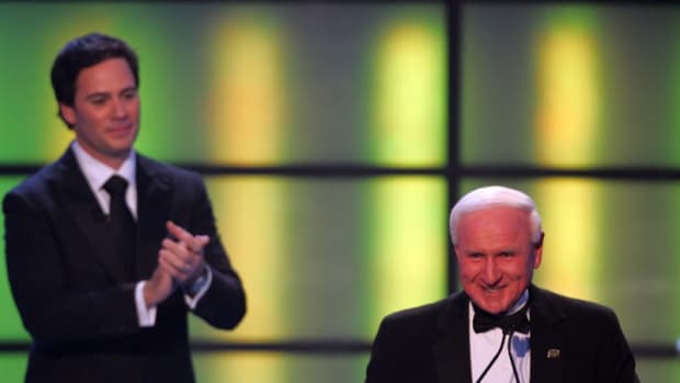 Jimmie Johnson applauds NASCAR legend Cale Yarborough during the 2008 NASCAR Awards Ceremony in New York City. Photo: Getty Images via NASCAR/ISC Archives.